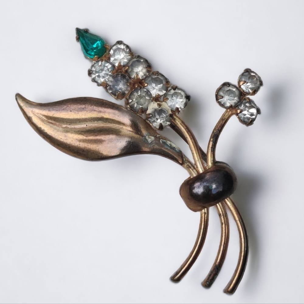 Antique brass and paste stones floral brooch